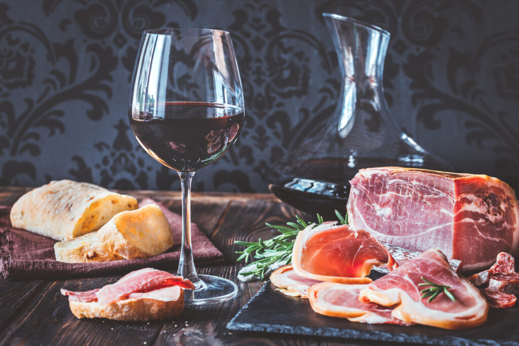 Red wine with prosciutto ham
