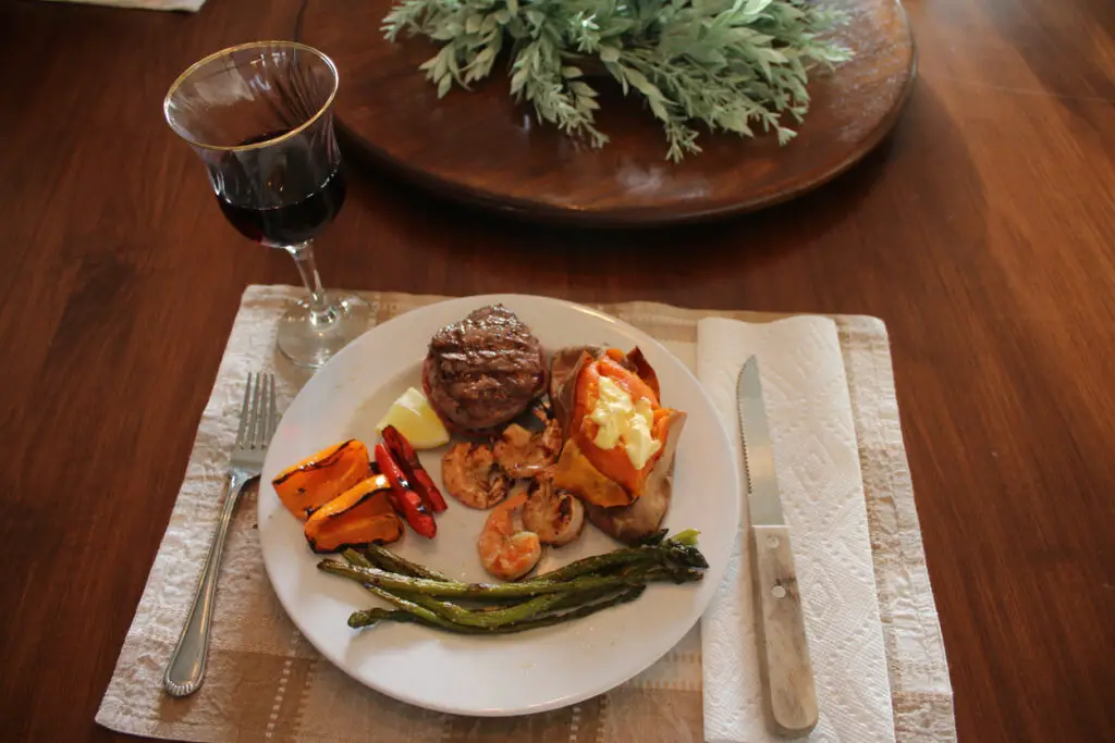 Surf and Turf with Baked Sweet Potato, Asparagus, Grilled Peppers, and Red Wine