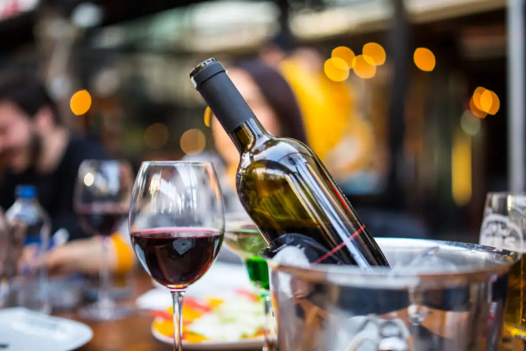 red wine on young adults valentines day table